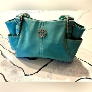 Lovely Relic bag in a beautiful aqua color and tons of room inside.